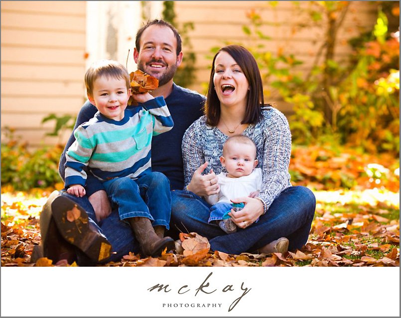 throwing autumn leaves family photo bowral
