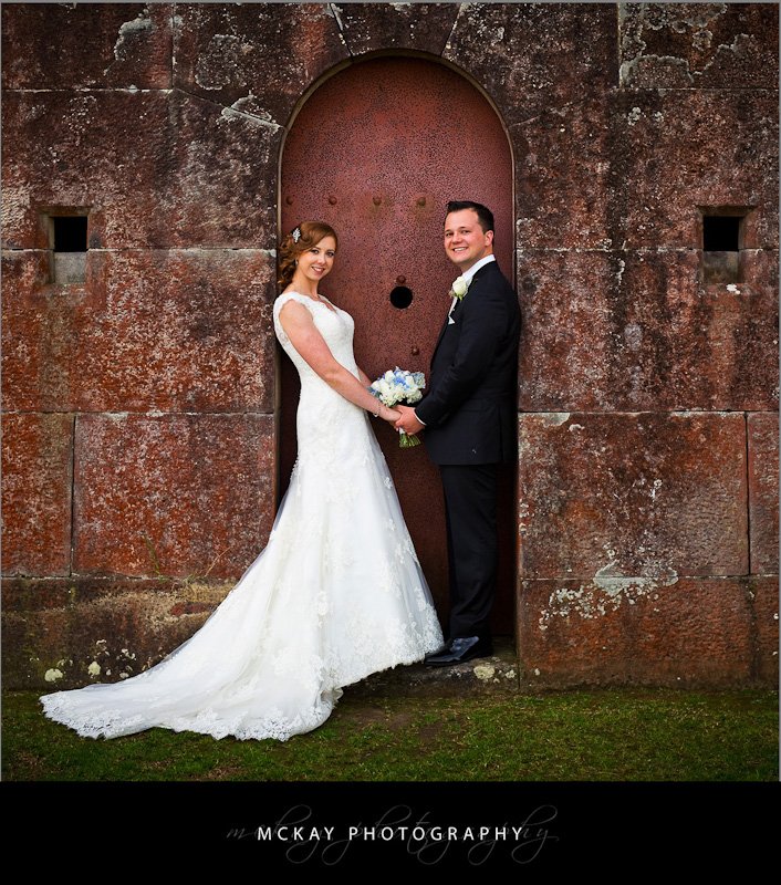 Vicki & Justin at the red wall Gunners Barracks Vicki Justin St Thomas North Sydney wedding