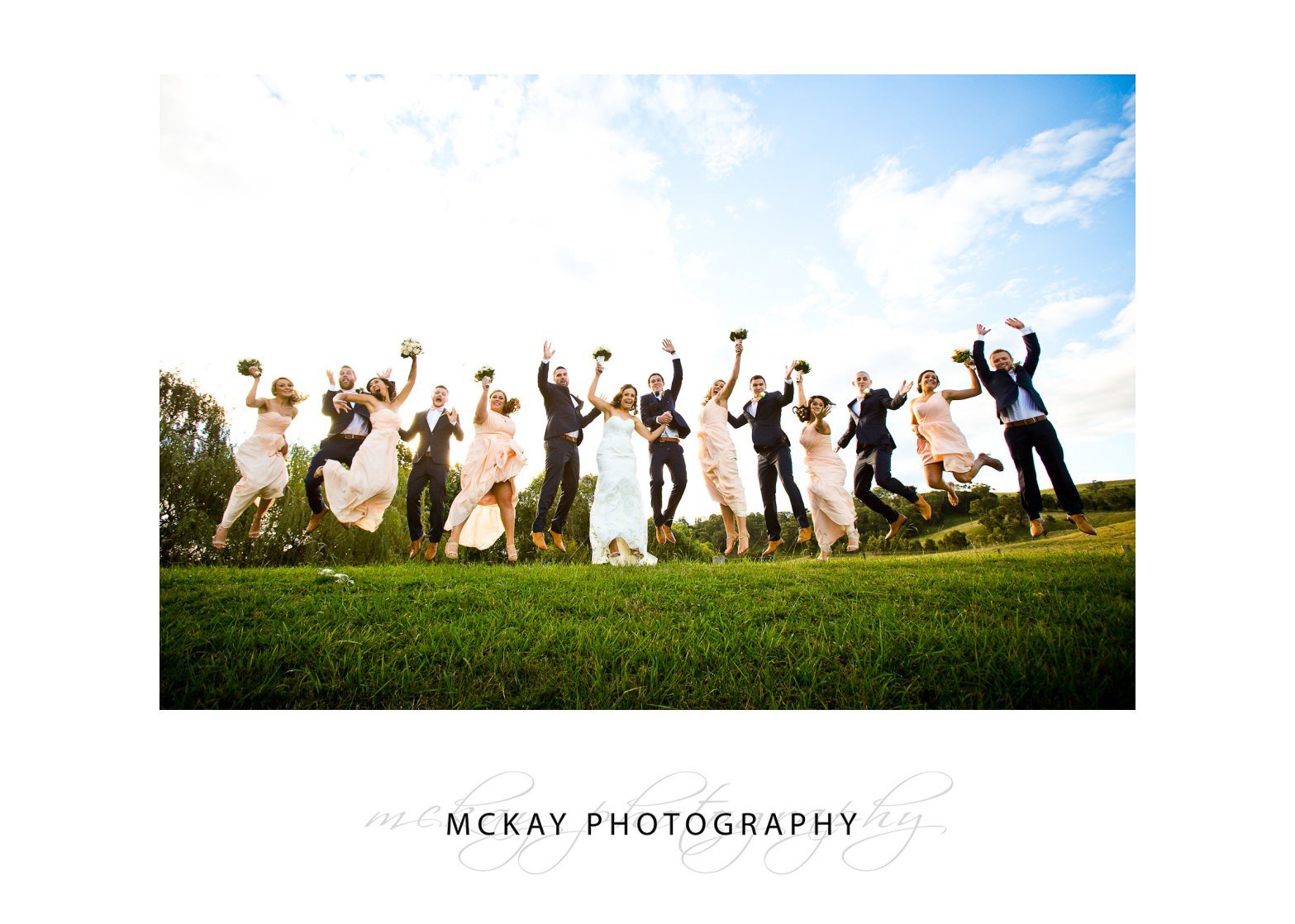 Bridal party jump photo