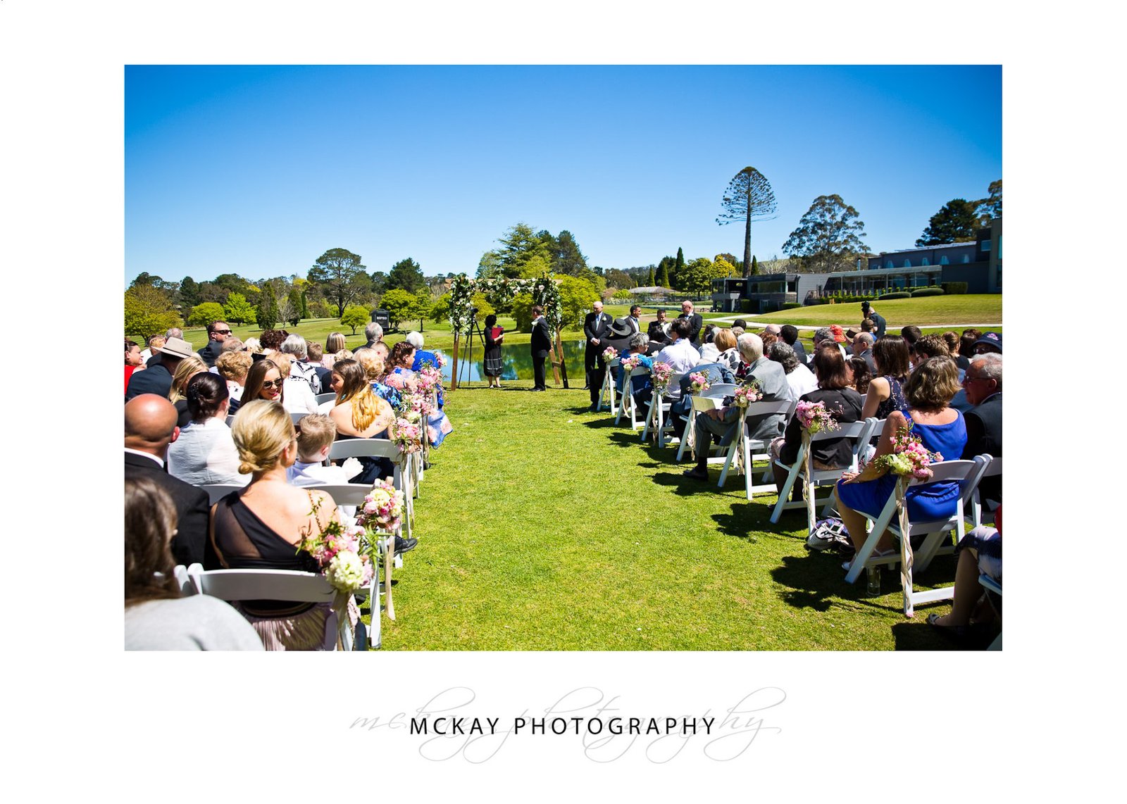 Wedding ceremony set up at Gibraltar Hotel near lake